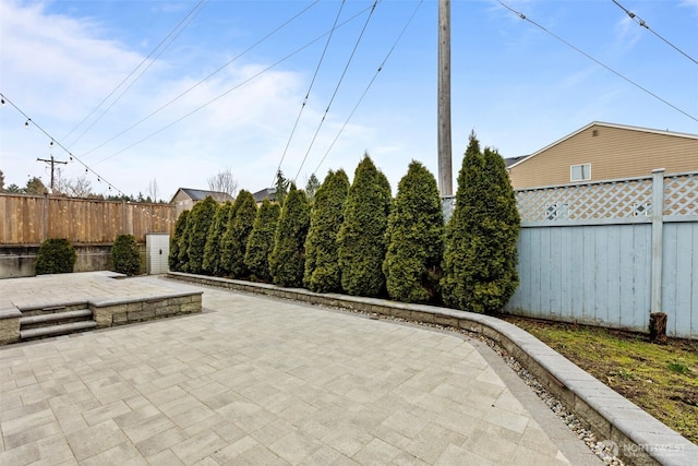 view of patio featuring a fenced backyard