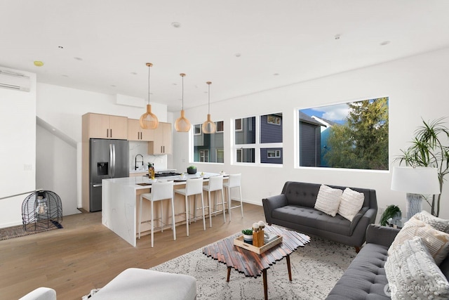 living area with light wood-style flooring