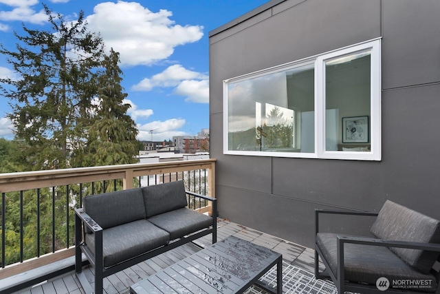 deck featuring outdoor lounge area