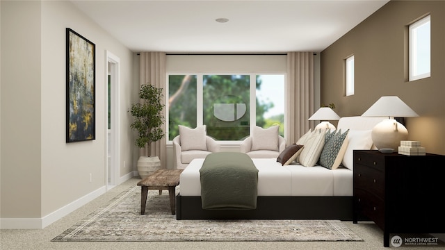 bedroom featuring carpet and baseboards