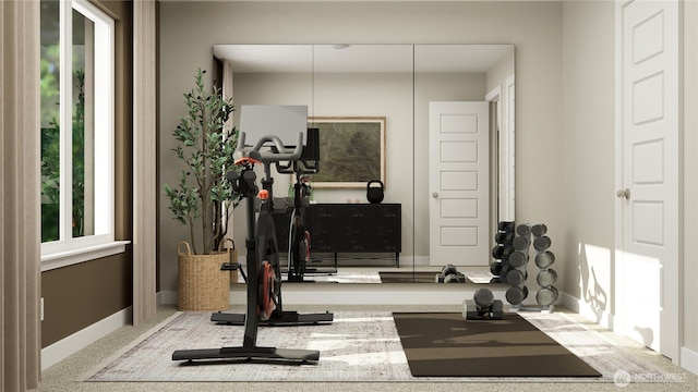 exercise area with baseboards