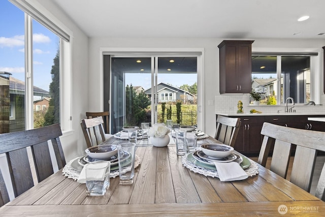 dining room with wood finished floors