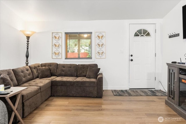 living area featuring light wood-style flooring