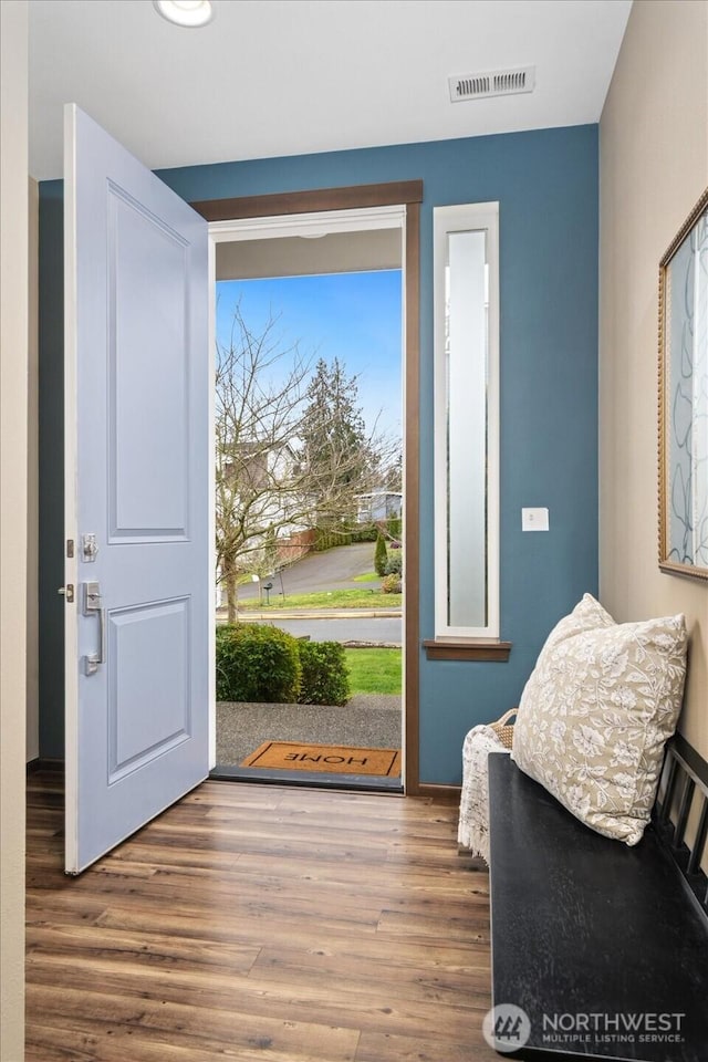 entryway with visible vents and wood finished floors