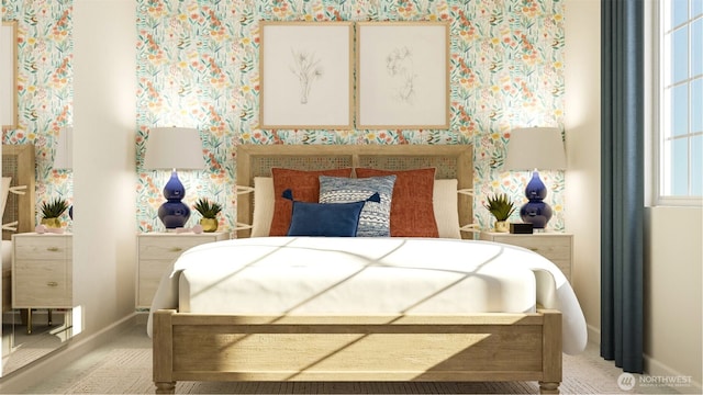 bedroom featuring wallpapered walls and baseboards