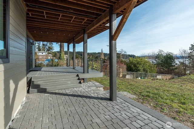 view of patio / terrace featuring fence