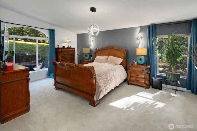 carpeted bedroom featuring vaulted ceiling