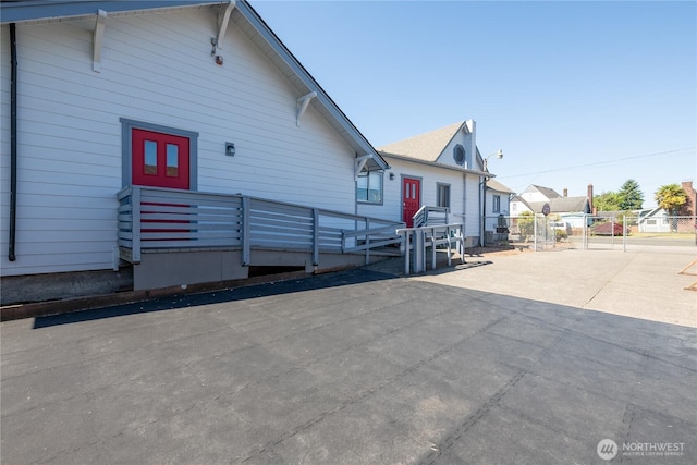 view of front of house with fence