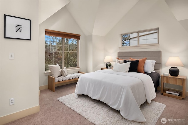 bedroom featuring light carpet, baseboards, and vaulted ceiling