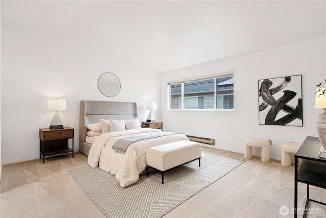 bedroom featuring light carpet and baseboard heating