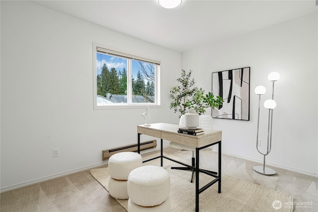 office featuring a baseboard radiator, light colored carpet, and baseboards