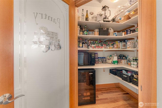 pantry featuring wine cooler