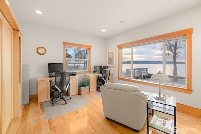 office space with recessed lighting and light wood-style floors