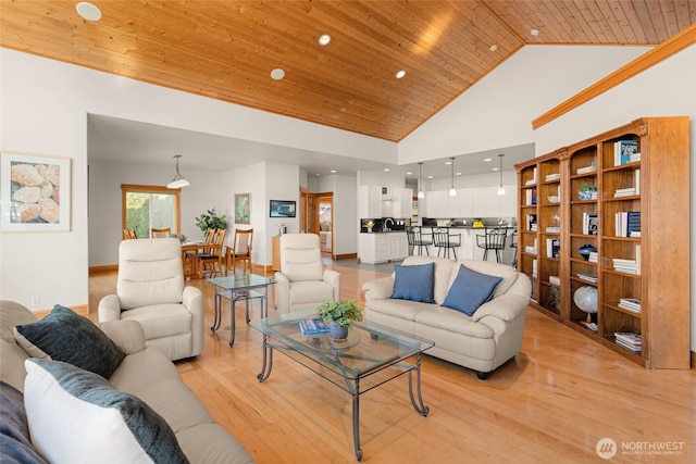 living area featuring wooden ceiling, high vaulted ceiling, light wood finished floors, and recessed lighting