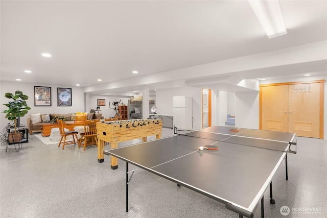 game room featuring light speckled floor and recessed lighting