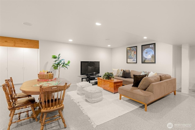 living room with baseboards and recessed lighting