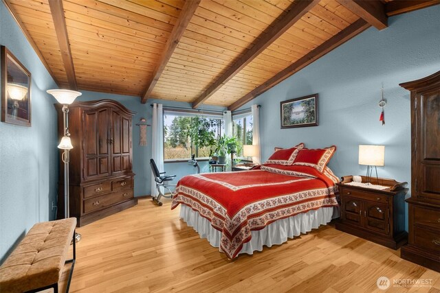 bedroom with wooden ceiling, light wood-style flooring, and vaulted ceiling with beams