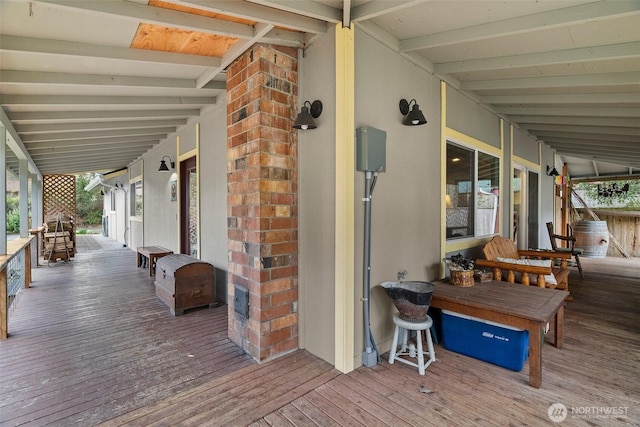 wooden terrace with covered porch