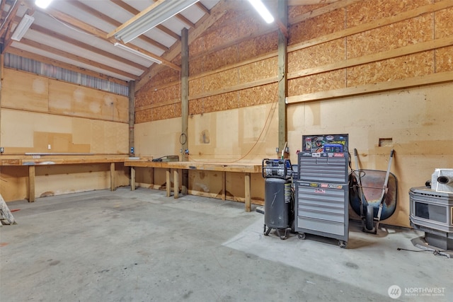 garage with a workshop area