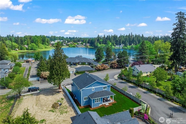 bird's eye view with a water view