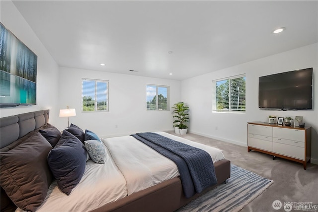 bedroom with carpet floors, baseboards, and recessed lighting