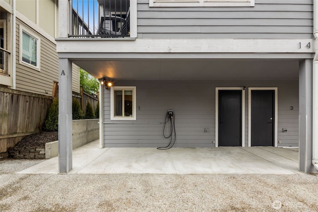 exterior space featuring fence and a patio