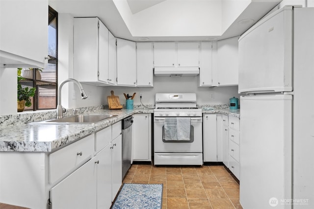 kitchen featuring light countertops, white appliances, a sink, and white cabinetry