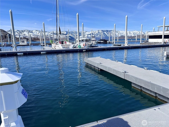 dock area with a water and mountain view