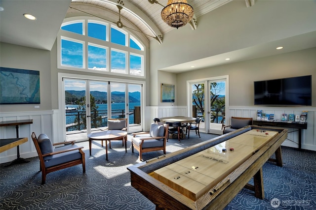 game room featuring carpet floors, recessed lighting, french doors, and wainscoting