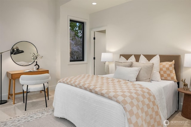 bedroom featuring recessed lighting, baseboards, and light colored carpet