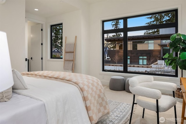 carpeted bedroom featuring recessed lighting