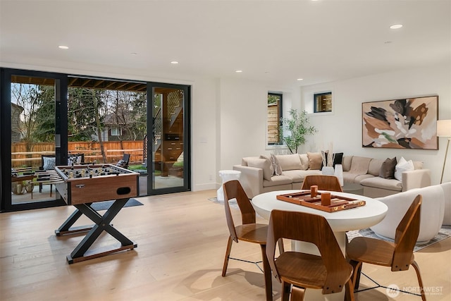 game room featuring recessed lighting and light wood-style flooring