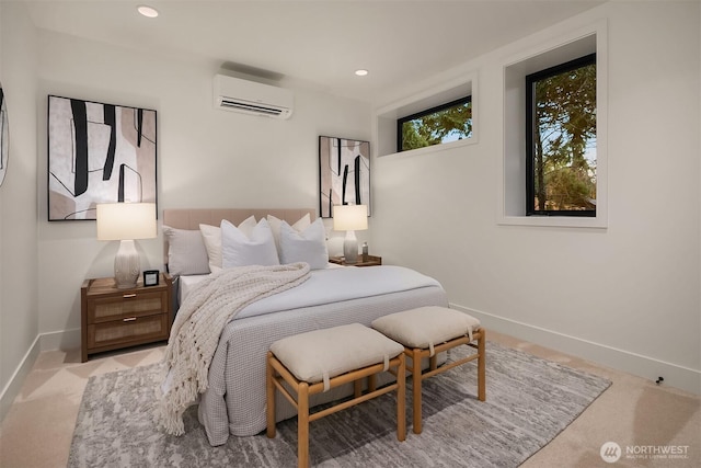 carpeted bedroom featuring recessed lighting, baseboards, and a wall mounted air conditioner