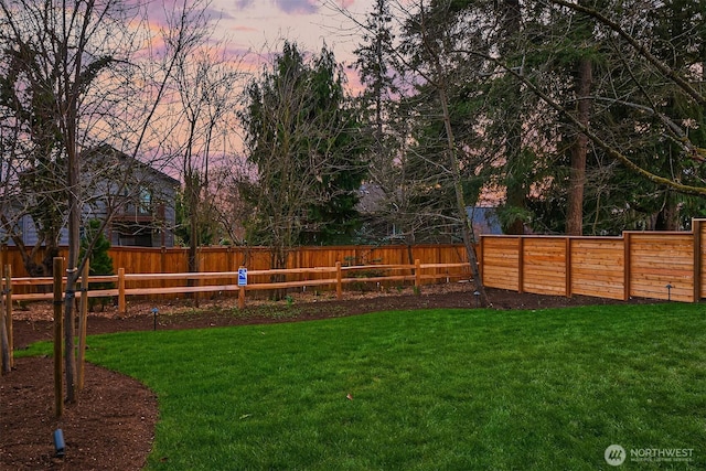 view of yard featuring a fenced backyard