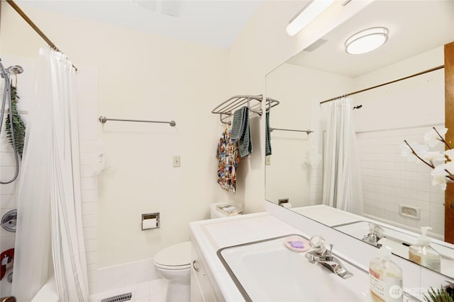 full bath with visible vents, baseboards, toilet, tile patterned flooring, and vanity