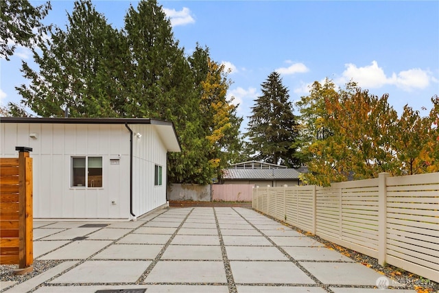 view of patio / terrace featuring fence