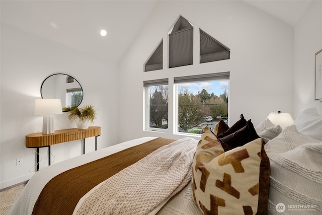 bedroom featuring high vaulted ceiling, recessed lighting, and baseboards