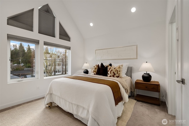 bedroom with baseboards, high vaulted ceiling, recessed lighting, and light colored carpet