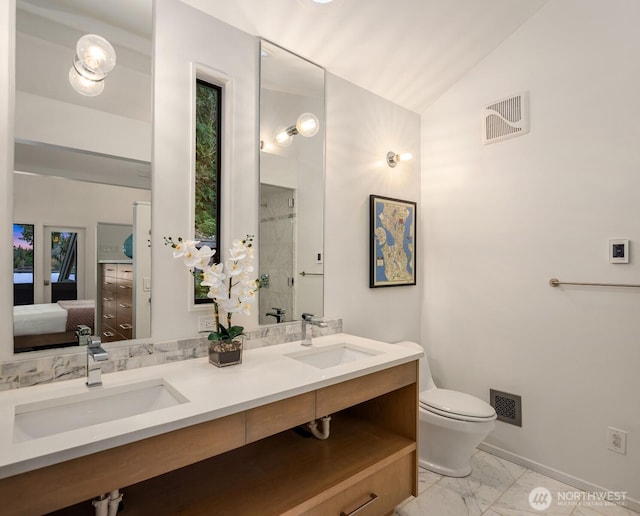 full bath featuring lofted ceiling, marble finish floor, a sink, and connected bathroom