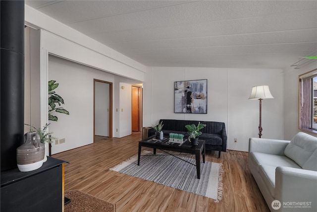 living room with wood finished floors