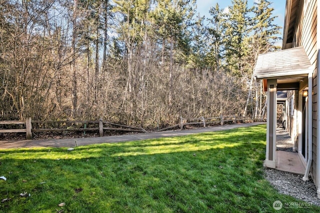 view of yard with fence