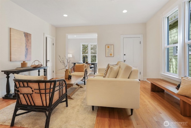 sitting room with recessed lighting and light wood finished floors