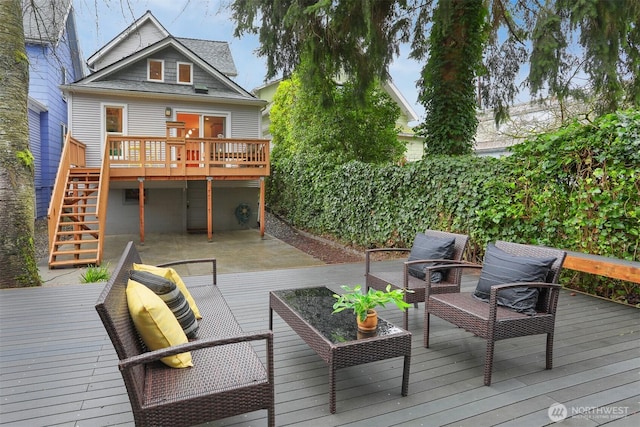 deck featuring stairway and outdoor lounge area