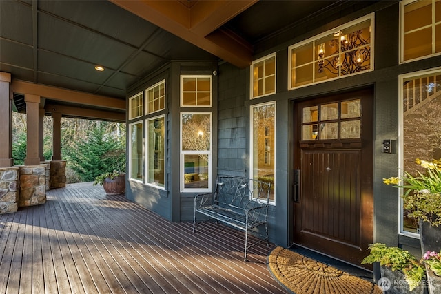 entrance to property featuring a porch