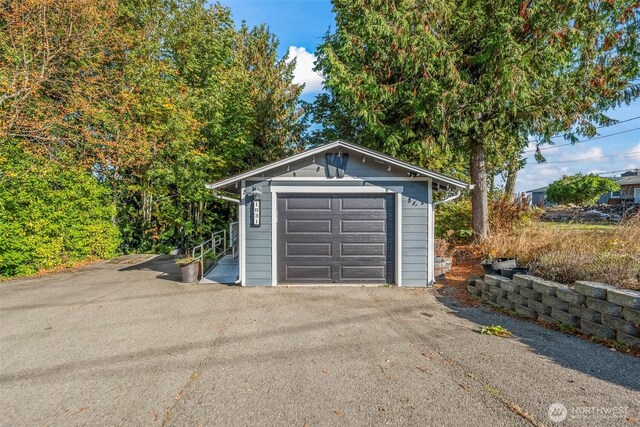 1831 Miracle Mile Dr E, Port Orchard, WA 98366 - detached garage featuring aphalt driveway