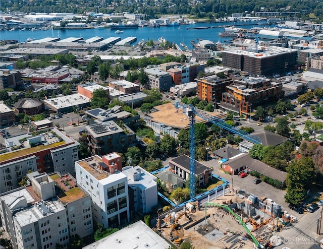 birds eye view of property featuring a water view