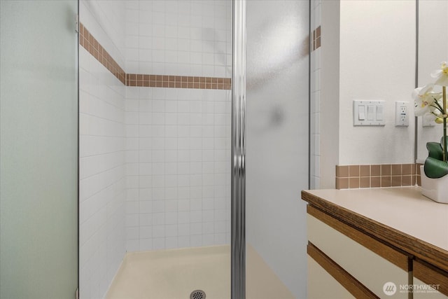 bathroom with a stall shower