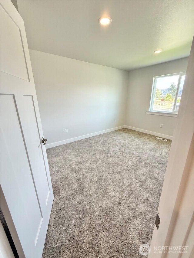2575 1st St SE, East Wenatchee, WA 98802 - empty room featuring carpet flooring and recessed lighting
