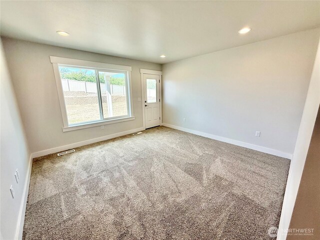 2575 1st St SE, East Wenatchee, WA 98802 - carpeted empty room with recessed lighting