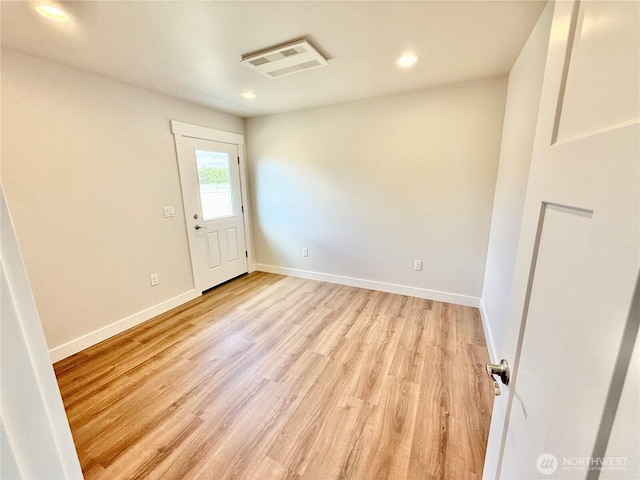 2575 1st St SE, East Wenatchee, WA 98802 - spare room featuring light wood finished floors and recessed lighting